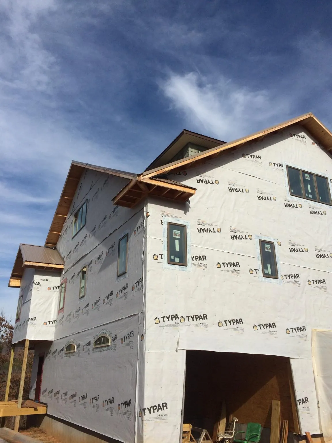 Stick built house wrapped in Typar with new roof framing and dormers in Ocean Beach